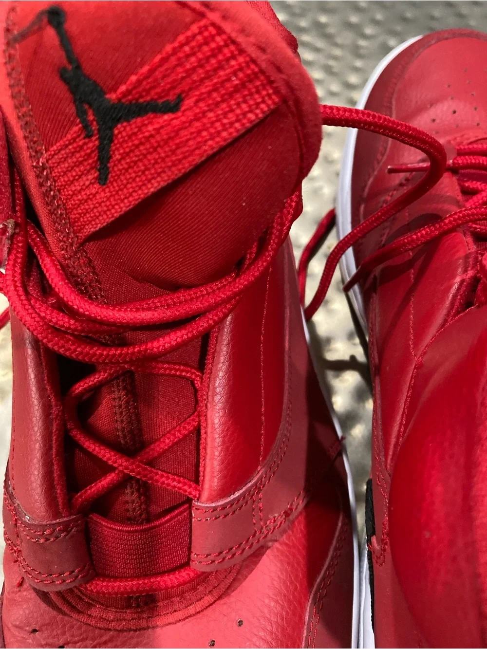 Jordan Red High-Top Sneaker with White Label Detail